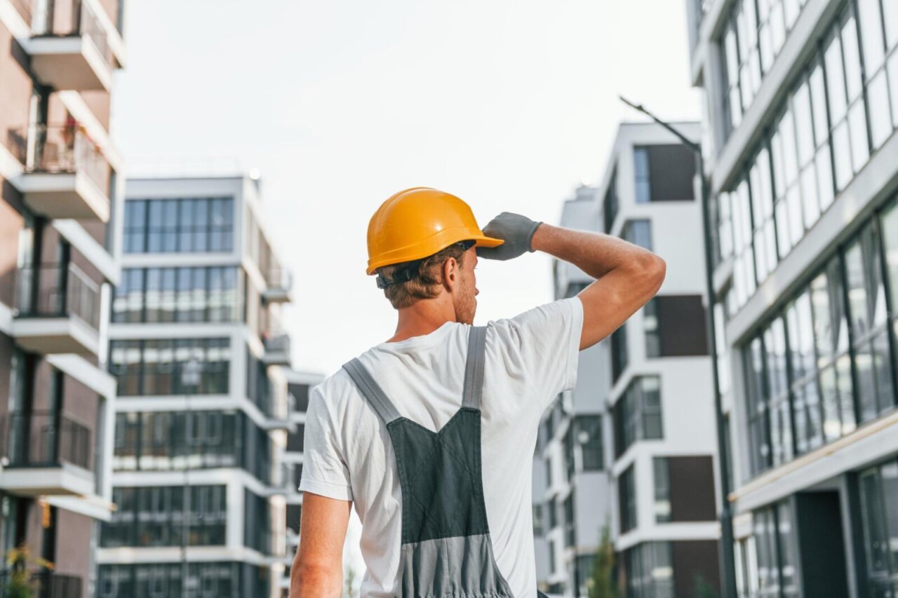 results-work-young-man-uniform-construction-daytime